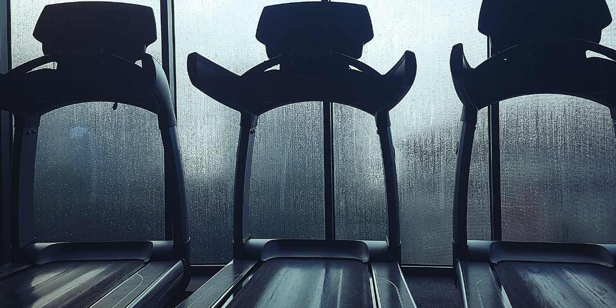 Person exercising indoors during the rainy season while following monsoon fitness tips at Meera's Fitness Centre in Thane West.