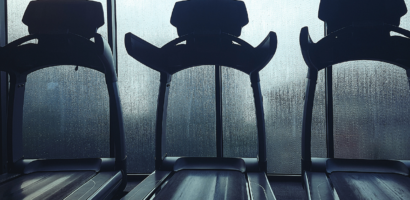 Person exercising indoors during the rainy season while following monsoon fitness tips at Meera's Fitness Centre in Thane West.