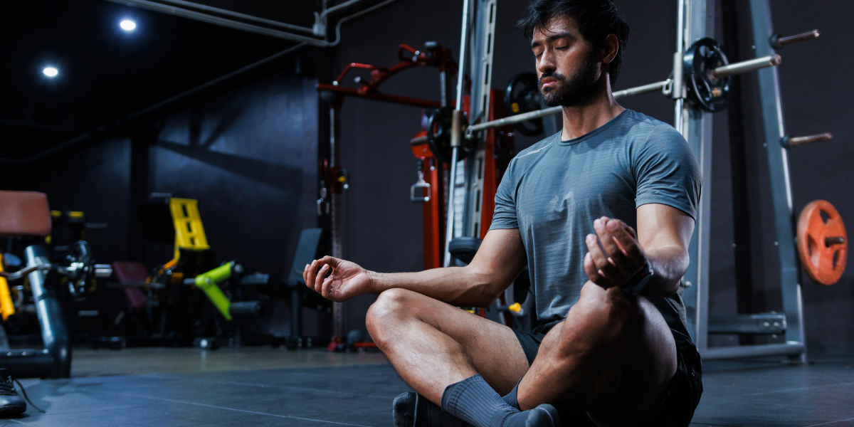 Person practicing meditation during a peaceful morning wellness routine