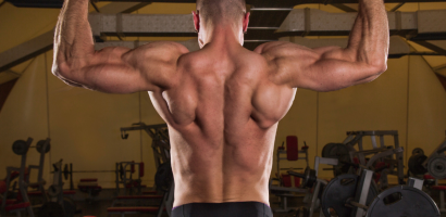 Person performing strength training to build muscle during winter 2026